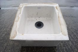 An Armitage Shanks Belfast sink, 33cm high x 18cm square,