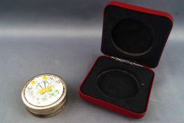 A silver and enamel plaque set 1981 Royal Commemorative round box, with the flowers of the Union,