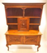 A late 19th century oak dresser/sideboard, the top set a cornice over a baluster support,