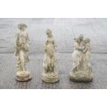 Three composite garden statues,