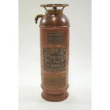 A copper and brass 'The Underwriters' fire extinguisher, made by John Kerr & Co, Manchester,