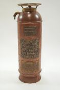 A copper and brass 'The Underwriters' fire extinguisher, made by John Kerr & Co, Manchester,