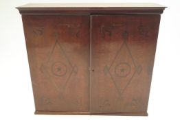A 19th century ebony hardwood inlaid hanging two door cabinet,
