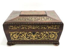 A William IV rosewood and brass inlaid sewing box, the top opening to reveal a fitted tray,