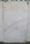 A white Carrara marble panel, (sold by order of the Community and Trustees of Downside Abbey),