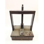 A 19th century mahogany press, with fitted base drawer,