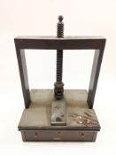 A 19th century mahogany press, with fitted base drawer,