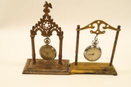 A Victorian Gothic brass watch stand,