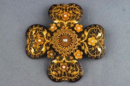 A Victorian yellow metal floral brooch