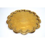 A Middle Eastern brass lobed tray,