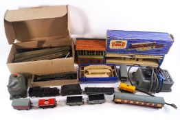 A Hornby '0' gauge signal box and a selection of Dublo locomotives,