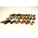 A collection of play worn Dinky cars