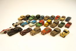 A collection of play worn Dinky cars