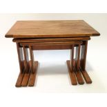 A nest of G Plan tables in teak,