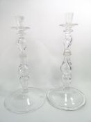 A large pair of glass candlesticks with baluster stems and folded foot (2),