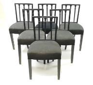 A set of ten ebonised dining chairs with stuffover seats and square tapering legs