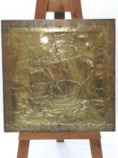 An Arts & Crafts brass wall panel, decorated galleon at sail, circa 1920,