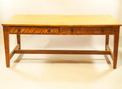 A stripped mahogany kitchen table with two frieze drawers on square tapering legs linked by H