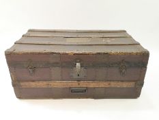 A 19th century composition and wood bound trunk,