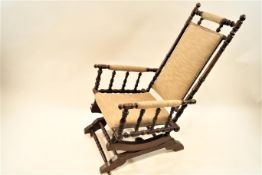 A 19th century turned mahogany 'American' rocking chair