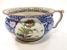 A Victorian pottery chamber pot,