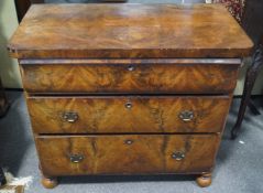 A Continental chest of three long drawers