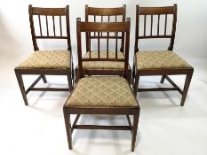 A set of six George III mahogany dining chairs with straight splats ,