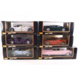 A set of six cased model cars, Maisto Special Editions.