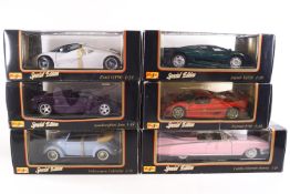 A set of six cased model cars, Maisto Special Editions.