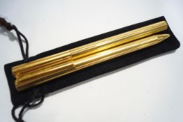 A Louis Vuitton gold plated fountain pen, with 18ct nib, marked 18ct and 750,