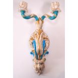 A Copeland porcelain wall bracket with two branch candle sconces,