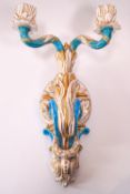 A Copeland porcelain wall bracket with two branch candle sconces,