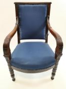 An Empire style French elbow chair,