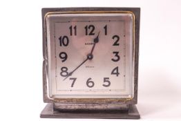 A pewter cased Liberty & Co Tudric clock of squared form with a spot hammered finish,