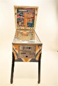 A Playmatic 'The 30's' pin ball machine on cast iron legs