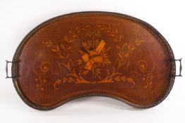 An Edwardian inlaid mahogany kidney form tray with brass gallery and twin handles,