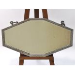 A large Art Deco polished steel wall mirror with hammered decoration c 1935,