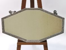 A large Art Deco polished steel wall mirror with hammered decoration c 1935,