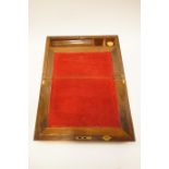 A Victorian walnut writing slope with brass inlay,
