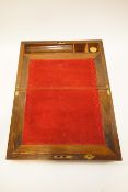 A Victorian walnut writing slope with brass inlay,