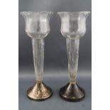 A pair of clear glass octagonal tulip shaped vases,