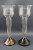 A pair of clear glass octagonal tulip shaped vases,