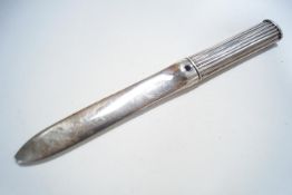 A Cartier silver plated paper knife,
