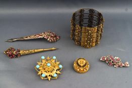 A collection of costume Jewellery to include two hair pins,