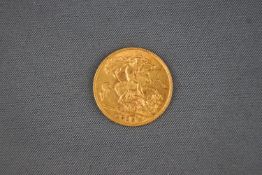 A half Sovereign George coin dated 1913.