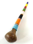 A Nigerian club, with multi coloured beaded grip,