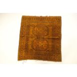 A small golden ground rug,