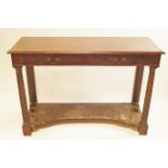 A mahogany serving table with capped fluted supports, fitted with two drawers, circa 1900,