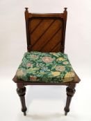 A Victorian oak hall chair, the solid seat on turned fluted tapering legs,