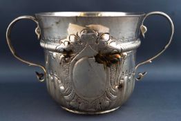 A Britannia standard Carolean style two handled cup/porringer, by Shaplands of London,